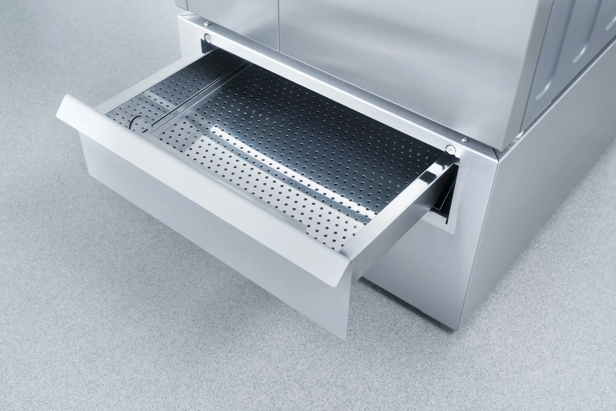 Die Flusenschublade kann einfach zur Reinigung herausgezogen werden.