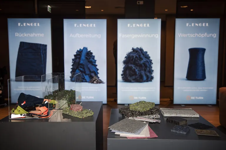 Das Alttextil-R&uuml;cknahmekonzept von ENGEL umfasst Sammlung, Transport, Sortierung, Recycling und Weiterverarbeitung zur&uuml;ckgewonnener Materialien zu neuer Kleidung.